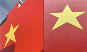 Sự thật thông tin 'người dân sơn hình cờ Tổ quốc trên tường, cán bộ bắt xoá'