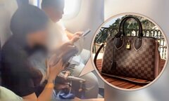 Hành khách vỗ tay khi người phụ nữ bị đuổi khỏi máy bay vì cái túi hàng hiệu