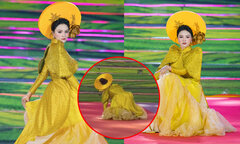 Vũ Thu Phương vấp ngã khi trình diễn áo dài