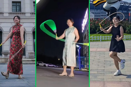 Người mẹ nhảy dây, nhào lộn trong bộ sườn xám khiến cộng đồng mạng thích thú