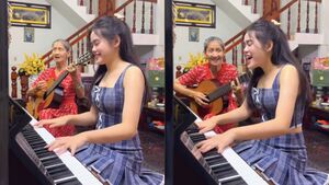 Clip cháu gái hát 'Thì thầm mùa xuân' cùng bà nội U70 'đốn tim' dân mạng