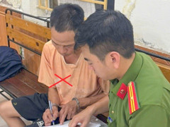 Tạm giữ hình sự ông bố buộc xích, kéo lê con trai trên phố ở Hải Phòng