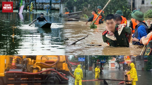 Nước ngập tới bụng người, 65 điểm tê liệt: Người Hà Nội oằn mình trong mưa