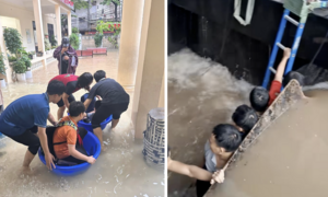 Loạt hình ảnh xúc động pha chút hài hước trong ngày Hà Nội ngập nặng