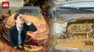 Tài xế ngao ngán trước ô tô bị bùn đất 'nuốt chửng'