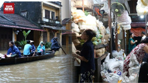 Khách Tây ở Hội An hối hả chèo thuyền tránh lũ 