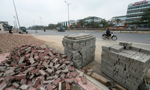 Mở rộng QL1A ở Hà Nội: Thông xe 1 tháng, vỉa hè, giải phân cách chưa hoàn thiện