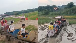 Clip 'khối nghỉ hè' ngồi đoàn tàu tự chế chơi ngoài ruộng khiến dân mạng mê tít
