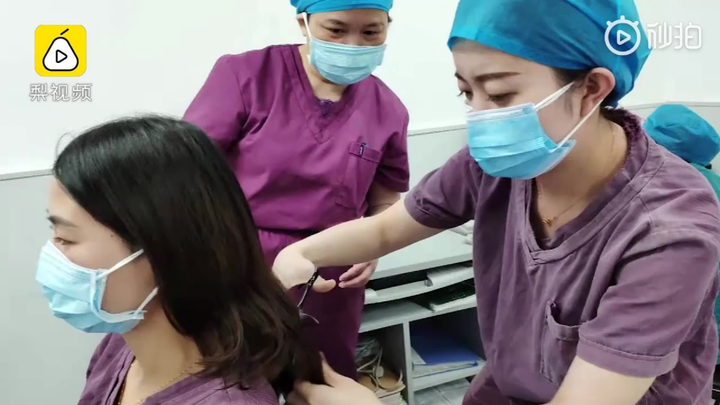 Những hình ảnh xúc động về cuộc chiến với virus ‘chết chóc’ của các bác sĩ Vũ Hán - 4