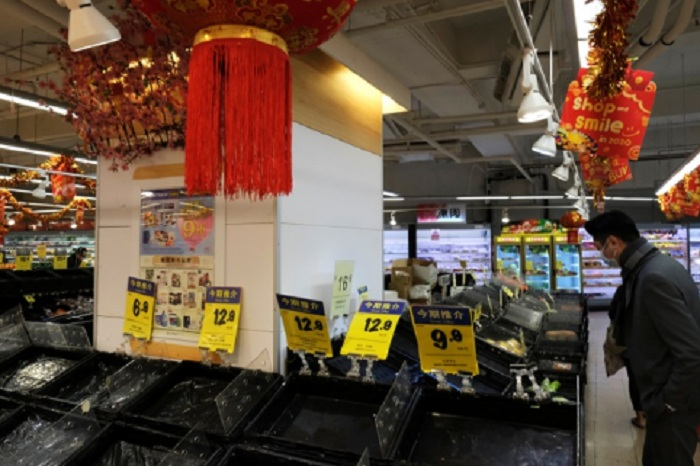 Hàng hóa siêu thị Vũ Hán trống trơn giữa 'tâm dịch' virus corona - 3