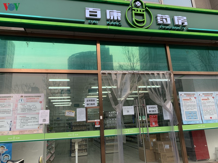 Ảnh: Đường phố Bắc Kinh vắng lặng vì dịch Covid-19 - 11