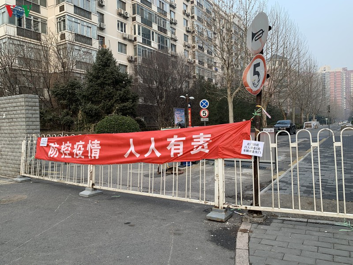 Ảnh: Đường phố Bắc Kinh vắng lặng vì dịch Covid-19 - 12