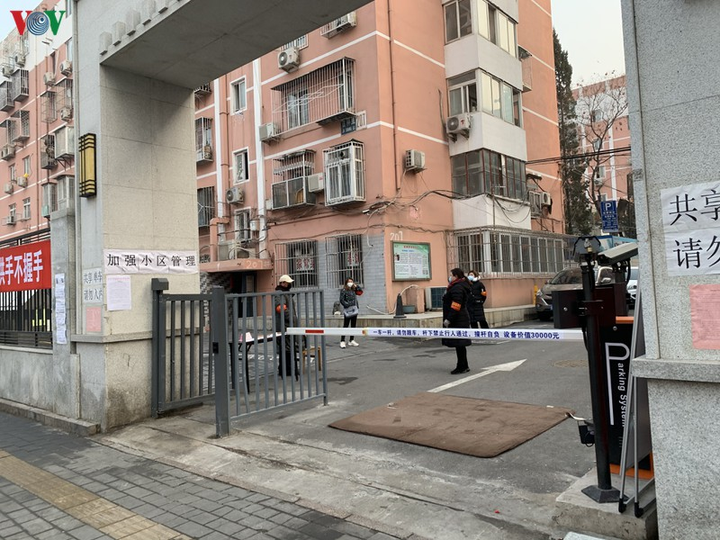 Ảnh: Đường phố Bắc Kinh vắng lặng vì dịch Covid-19 - 13