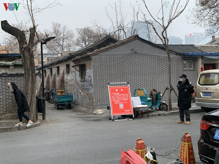 Ảnh: Đường phố Bắc Kinh vắng lặng vì dịch Covid-19 - 14