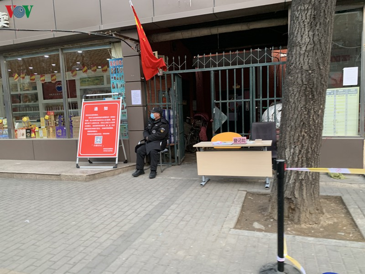 Ảnh: Đường phố Bắc Kinh vắng lặng vì dịch Covid-19 - 15