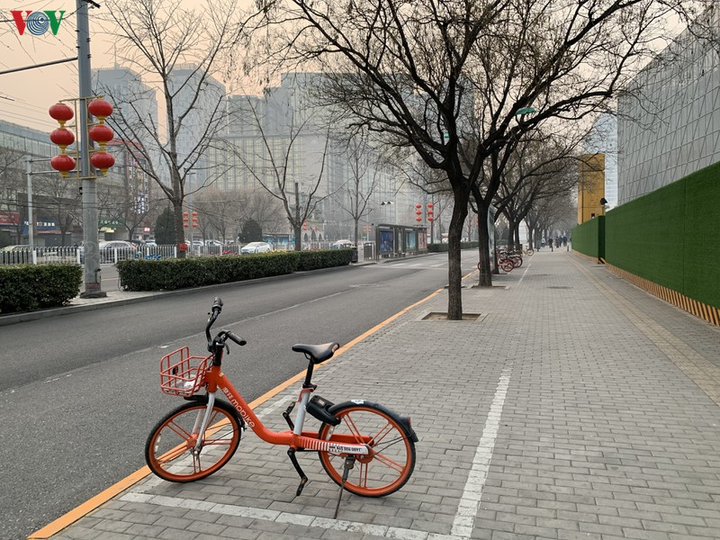 Ảnh: Đường phố Bắc Kinh vắng lặng vì dịch Covid-19 - 3