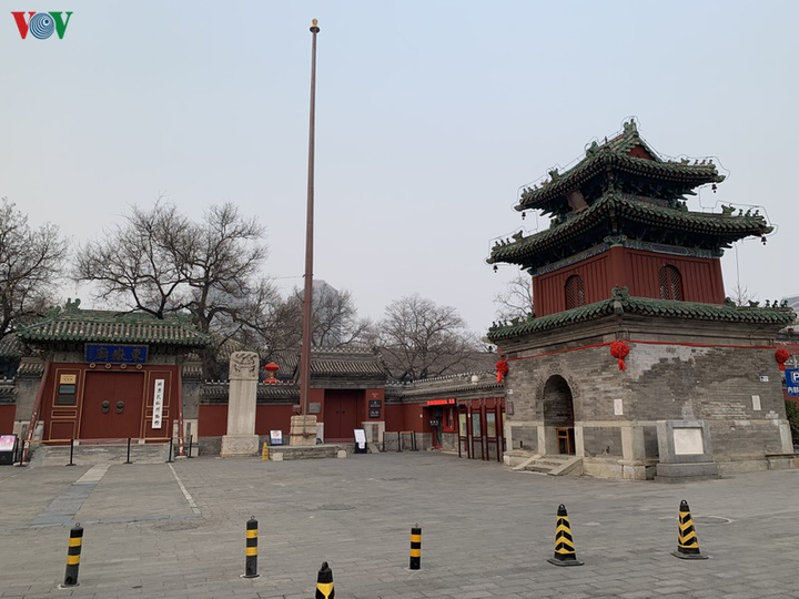 Ảnh: Đường phố Bắc Kinh vắng lặng vì dịch Covid-19 - 4