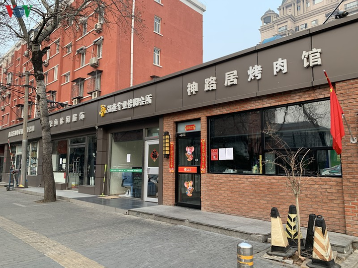 Ảnh: Đường phố Bắc Kinh vắng lặng vì dịch Covid-19 - 5