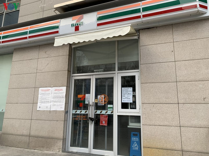 Ảnh: Đường phố Bắc Kinh vắng lặng vì dịch Covid-19 - 8