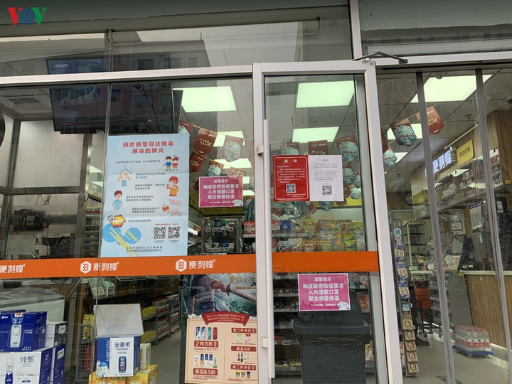 Ảnh: Đường phố Bắc Kinh vắng lặng vì dịch Covid-19 - 9