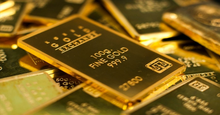 Giá vàng tăng, tiến sát 1.590 USD/ounce - 1