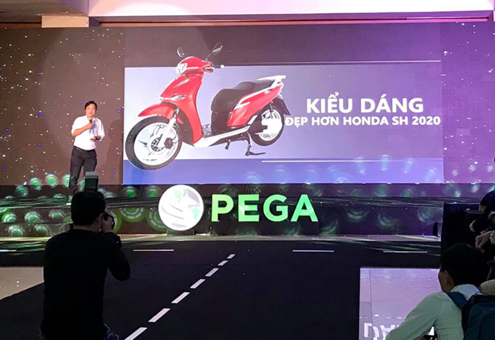 Bị Honda doạ kiện, hãng xe điện PEGA nói muốn 'làm bạn' như Messi và Ronaldo - 1
