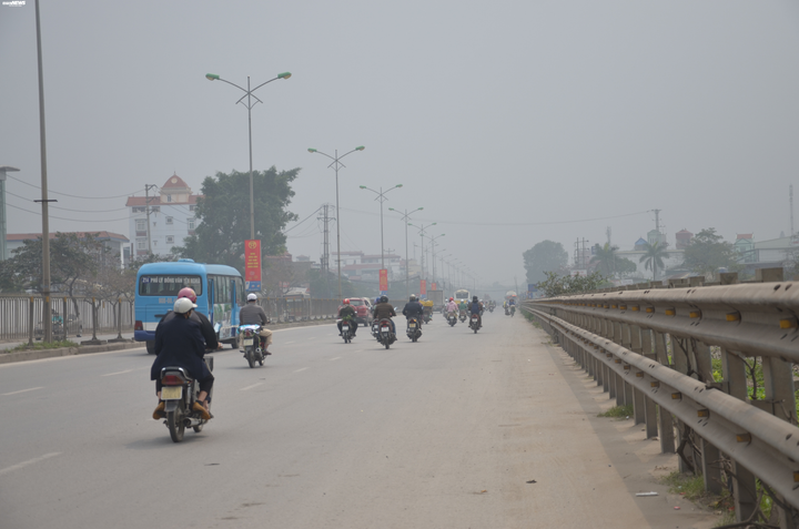 Ảnh: Hà Nội mù mịt dù trời có nắng, không khí ở mức có hại cho sức khoẻ - 8