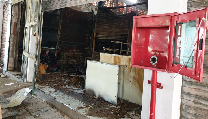 Ảnh: Chợ Thanh Quýt hoang tàn sau vụ cháy thiêu rụi 96 ki ốt - 10