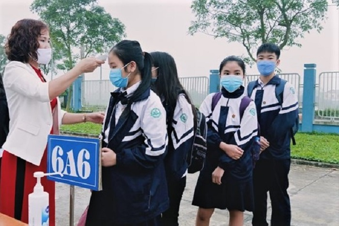 Ảnh: Học sinh mầm non, tiểu học rạng rỡ trở lại trường sau kỳ nghỉ dài vì Covid-19 - 5