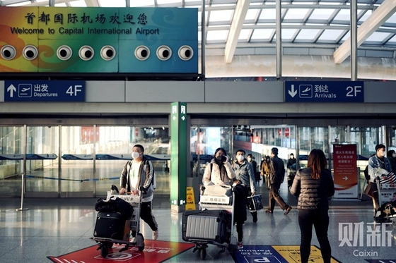 Vé máy bay tăng 10 lần, người Trung Quốc vẫn ồ ạt về nước tránh Covid-19 - 1