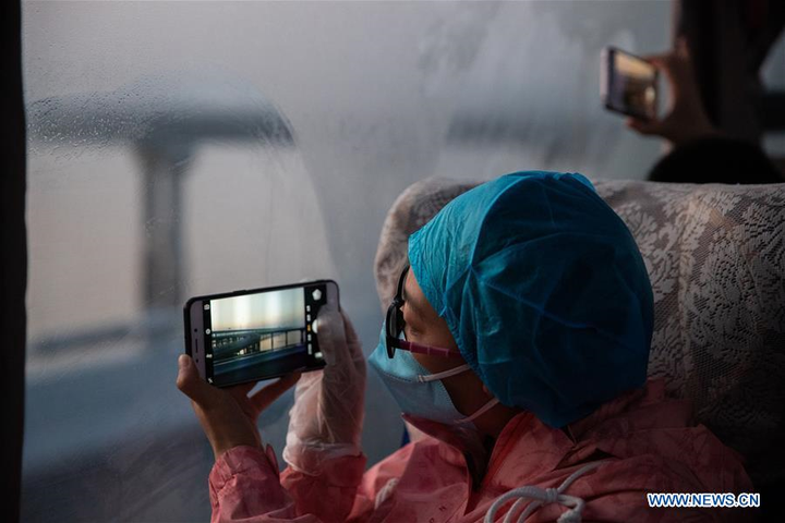 Covid-19 suy giảm, nhân viên y tế Trung Quốc rời Hồ Bắc - 15