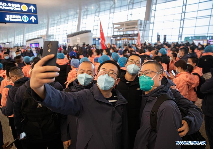 Covid-19 suy giảm, nhân viên y tế Trung Quốc rời Hồ Bắc - 9