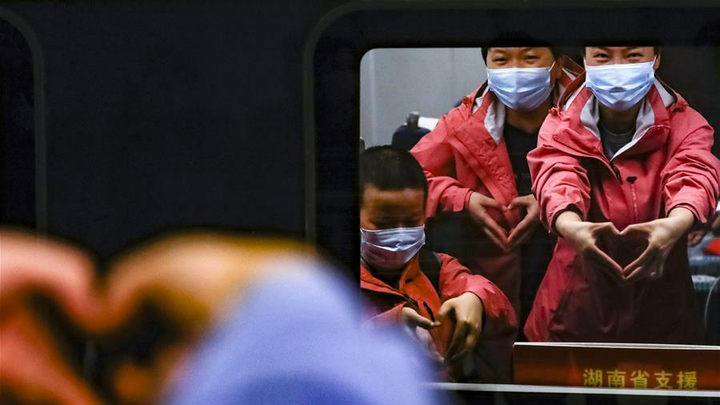 Covid-19 suy giảm, nhân viên y tế Trung Quốc rời Hồ Bắc - 6