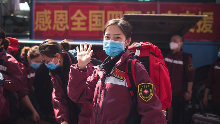 Covid-19 suy giảm, nhân viên y tế Trung Quốc rời Hồ Bắc - 5