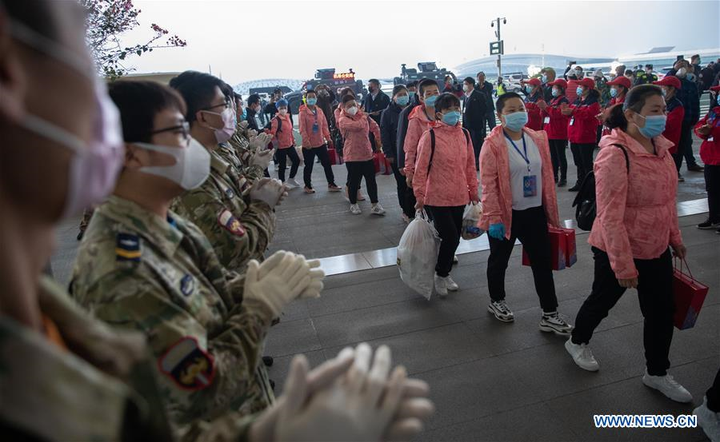 Covid-19 suy giảm, nhân viên y tế Trung Quốc rời Hồ Bắc - 14