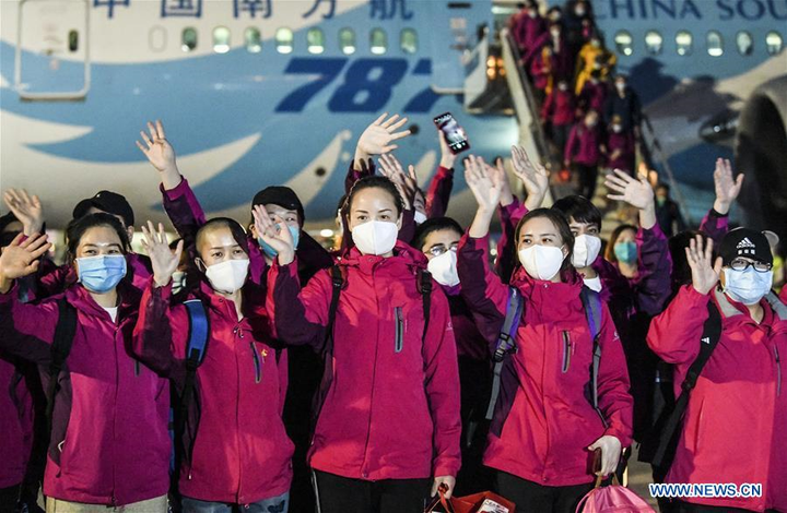 Covid-19 suy giảm, nhân viên y tế Trung Quốc rời Hồ Bắc - 2