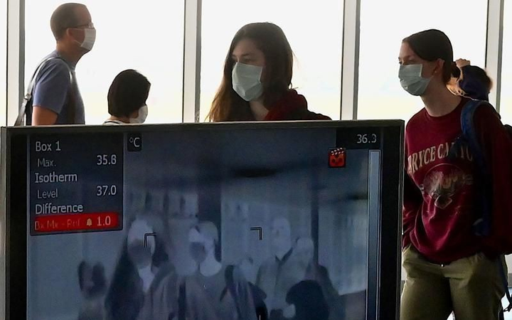 Dịch Covid-19: Khuyến nghị người Việt tại Lào không nên về nước - 1