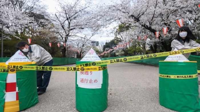 Các siêu đô thị Nhật Bản bắt đầu đóng cửa phòng Covid-19 - 1