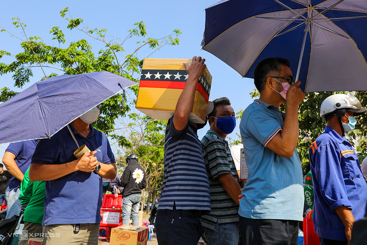 Thời tiết nắng nóng, virus corona tồn tại trong bao lâu? - 1