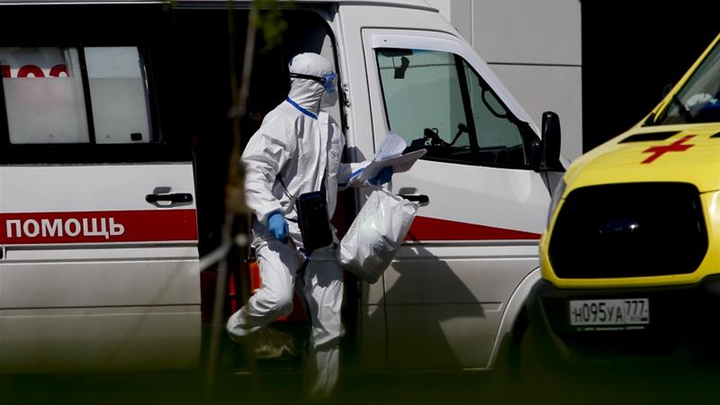 Gạt nỗi lo COVID-19, người dân tại ổ dịch lớn nhất nước Nga trở lại làm việc - 3