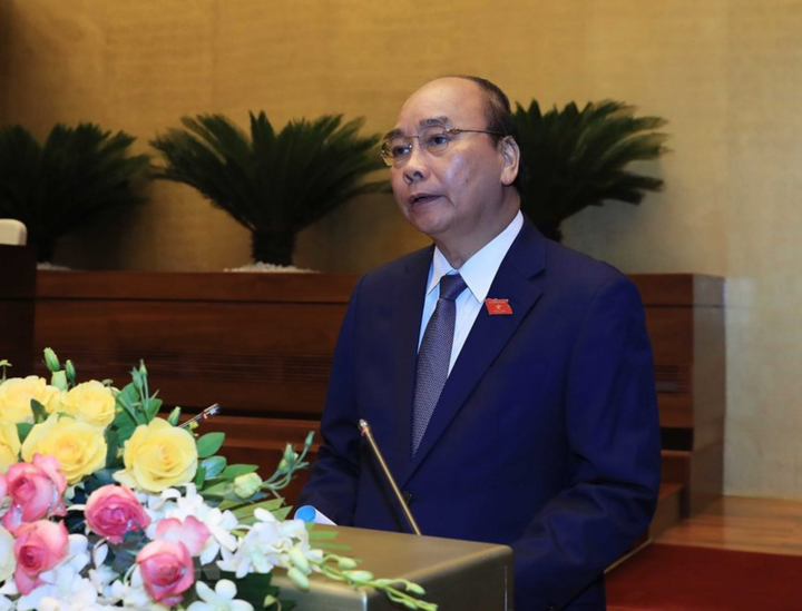 Thủ tướng đề nghị Quốc hội hoãn tăng lương - 1