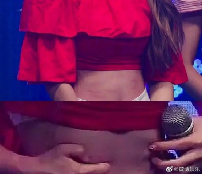 Nữ ca sĩ bị bạn cùng nhóm tấn công trên sân khấu - 1