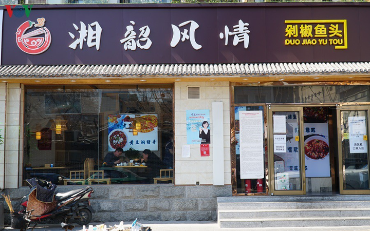 WHO: Bao bì cá hồi nhập khẩu có thể là nguồn lây nhiễm COVID-19 mới tại Bắc Kinh - 1