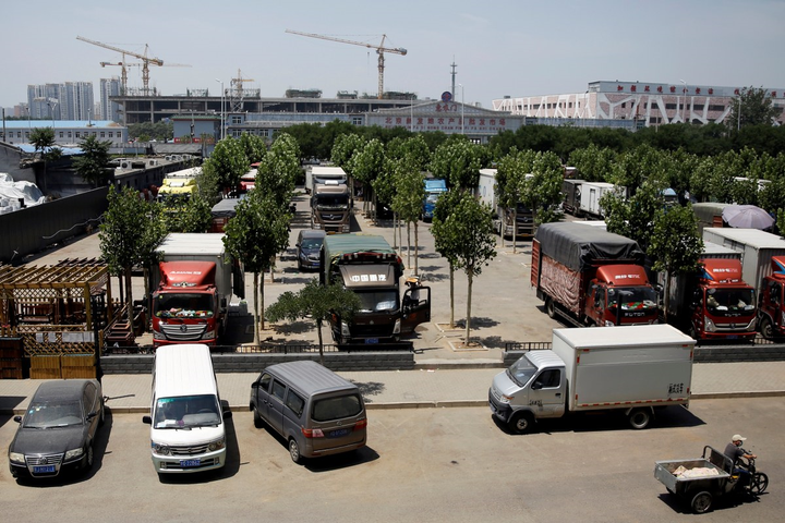 Ảnh: Xuất hiện ổ dịch mới, hàng nghìn người Bắc Kinh đi làm xét nghiệm COVID-19 - 7