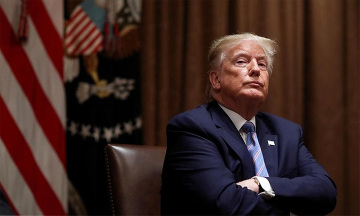 Tổng thống Trump ký đạo luật trừng phạt quan chức Trung Quốc - 1