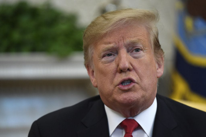 Thay đổi thái độ, ông Trump nói sẵn sàng đeo khẩu trang ở nơi công cộng - 1