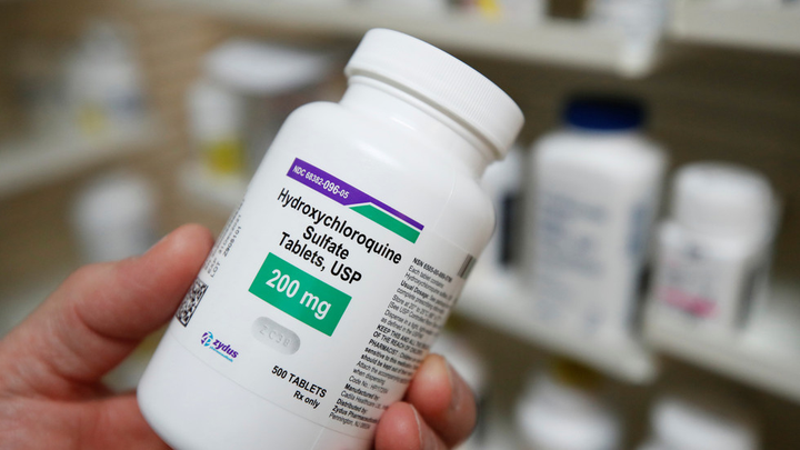 WHO dừng thử nghiệm thuốc trị sốt rét để ngừa COVID-19 - 1