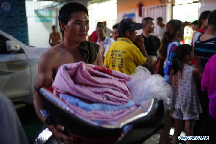 Ảnh: Cuộc sống của người dân chạy lũ ở Trung Quốc - 4