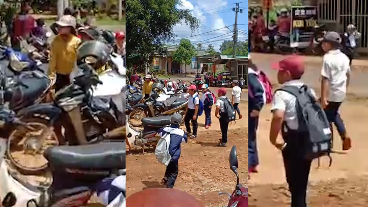 Đến giờ học, hiệu trưởng không mở cổng trường, học sinh phải đứng giữa trời nắng - 1