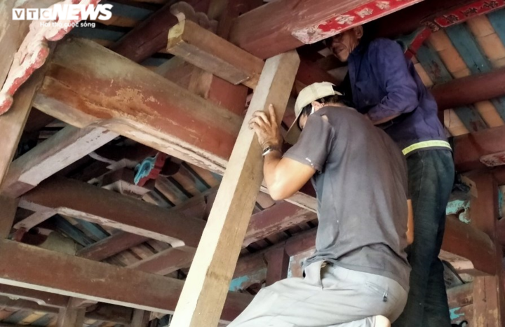 Ảnh: Phố cổ Hội An chằng chống di tích trước giờ bão số 5 đổ bộ - 4